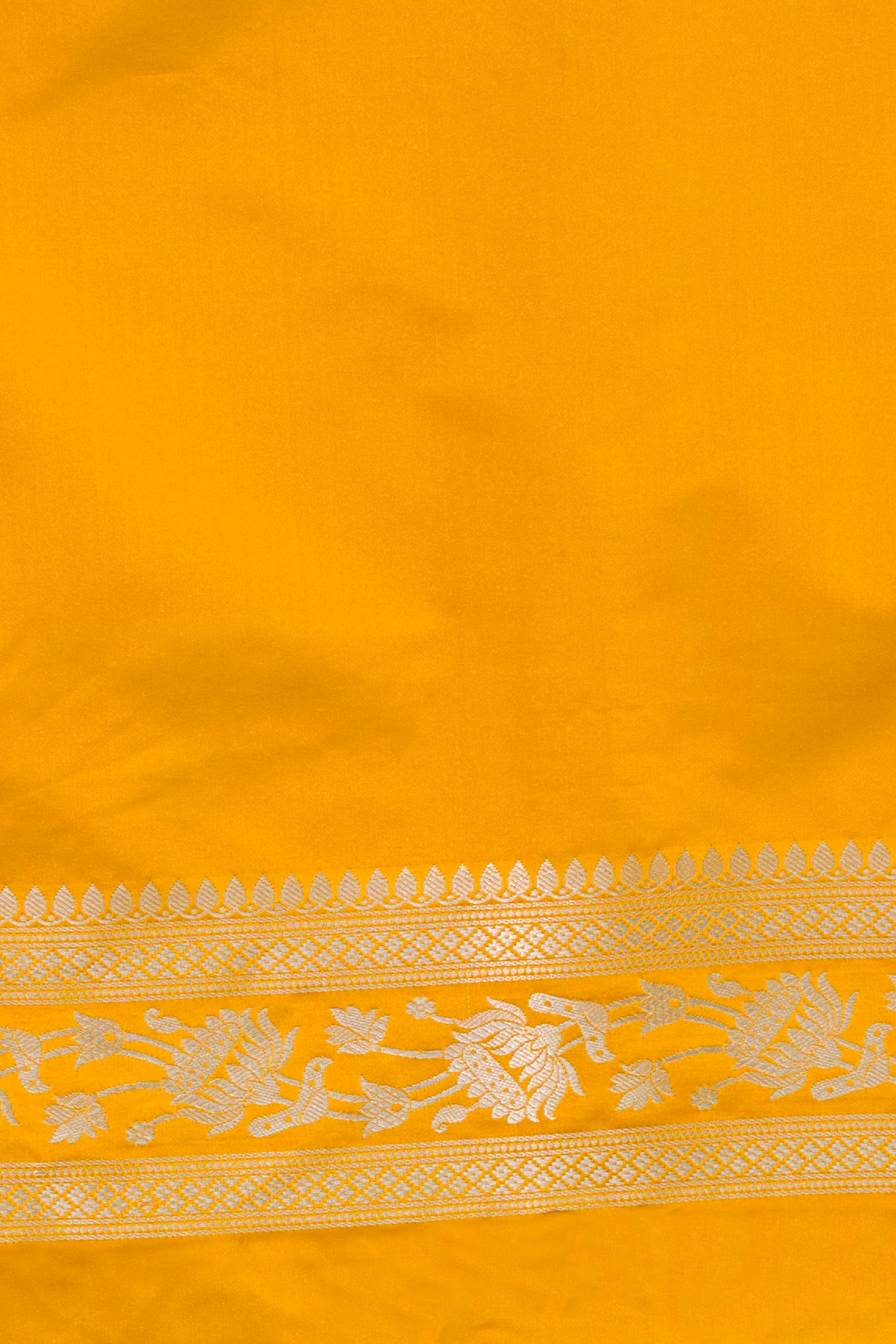 Yellow Mashru Silk Saree woven in Leaf inspired butis across body paired with Floral bel border