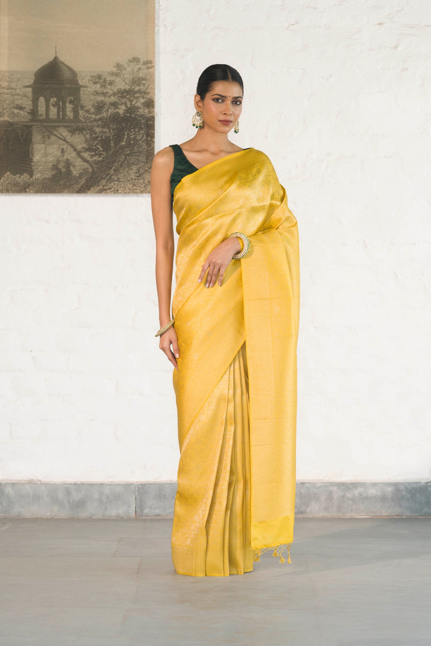 Yellow Soft Silk Saree Woven in Almond Zari within the Fabric giving smooth texture from in and out