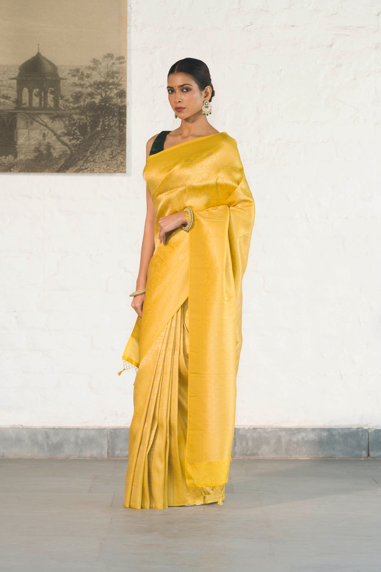 Yellow Soft Silk Saree Woven in Almond Zari within the Fabric giving smooth texture from in and out