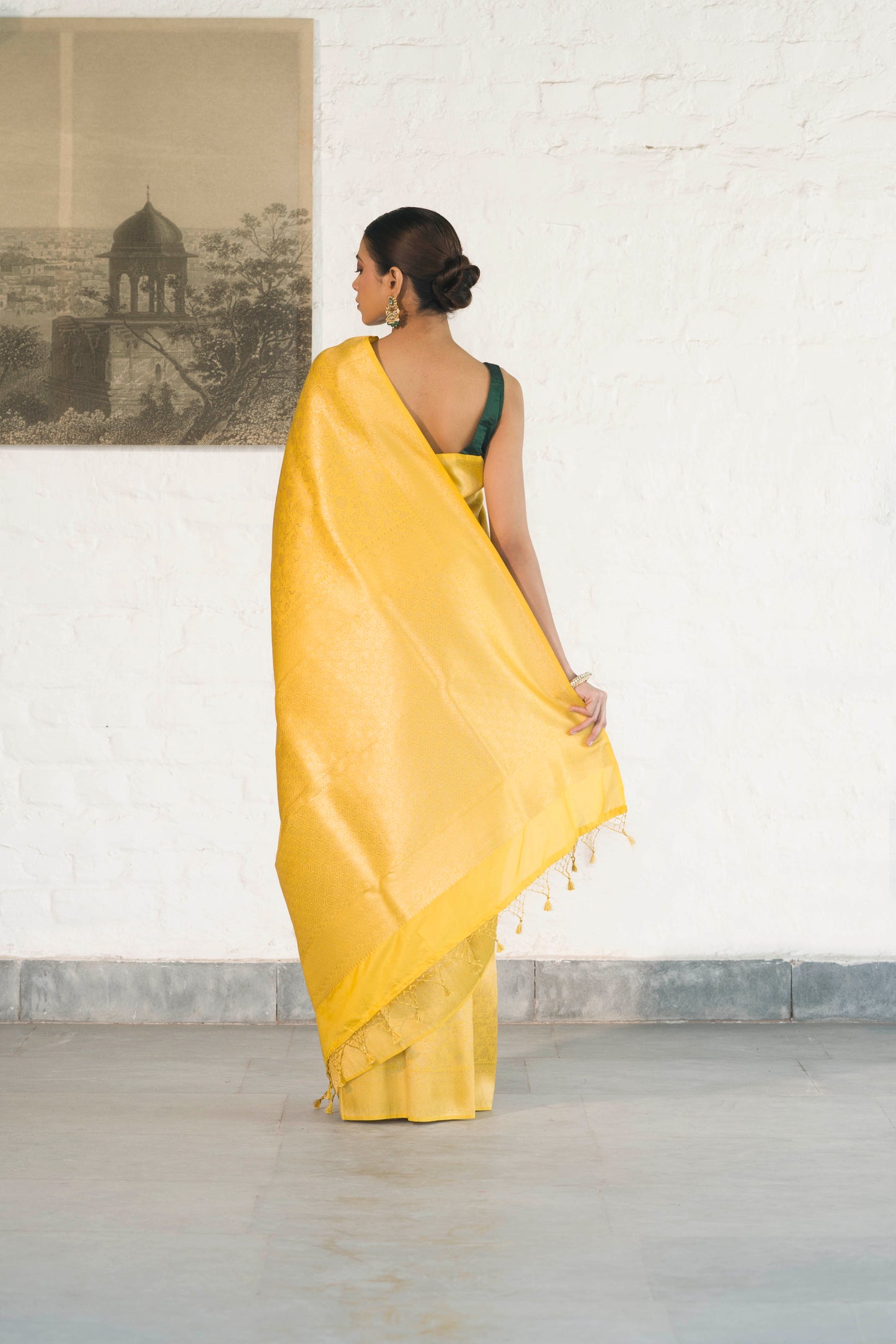 Yellow Soft Silk Saree Woven in Almond Zari within the Fabric giving smooth texture from in and out