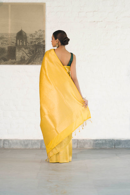 Yellow Soft Silk Saree Woven in Almond Zari within the Fabric giving smooth texture from in and out
