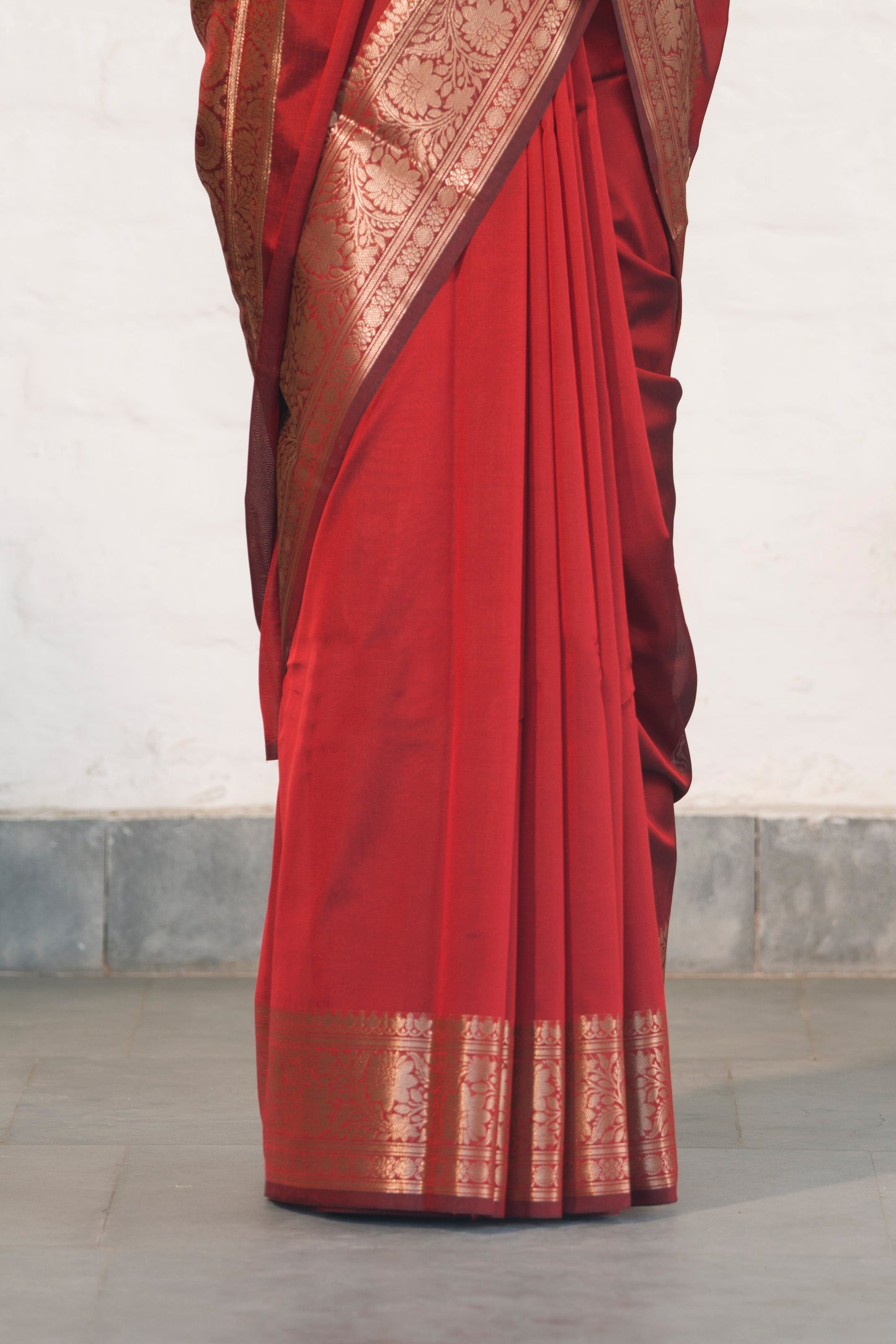 Maroon Plain Blend Silk Saree with traditional border palla and woven blouse