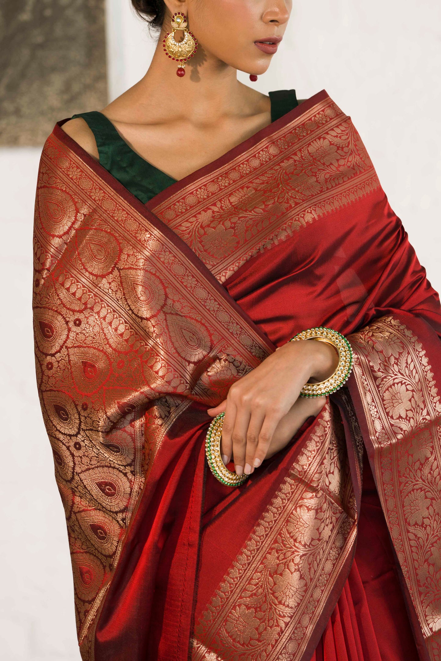 Maroon Plain Blend Silk Saree with traditional border palla and woven blouse