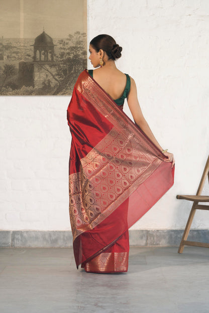 Maroon Plain Blend Silk Saree with traditional border palla and woven blouse