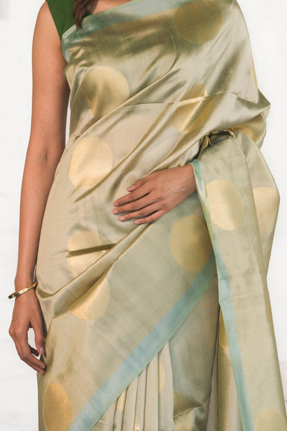 Pista Green Banarasi Raw Silk Saree with Zari Polka Buta paired with Temple Palla