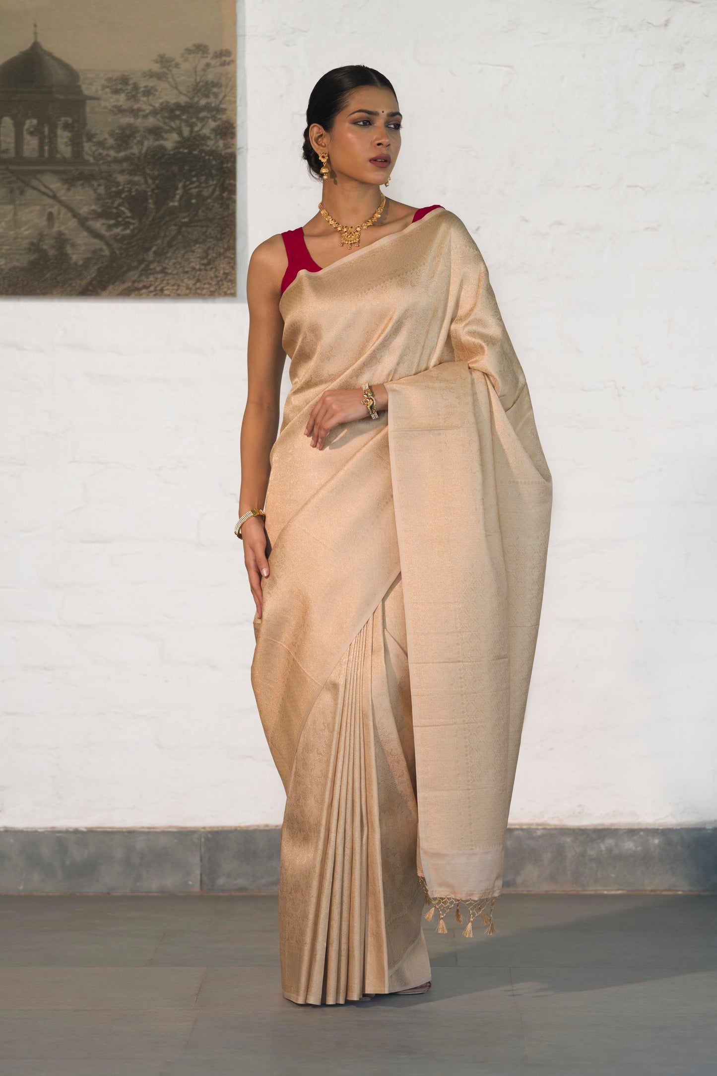 Cream Soft Silk Saree Woven in Almond Zari within the Fabric giving smooth texture from in and out