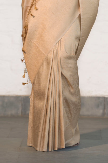 Cream Soft Silk Saree Woven in Almond Zari within the Fabric giving smooth texture from in and out