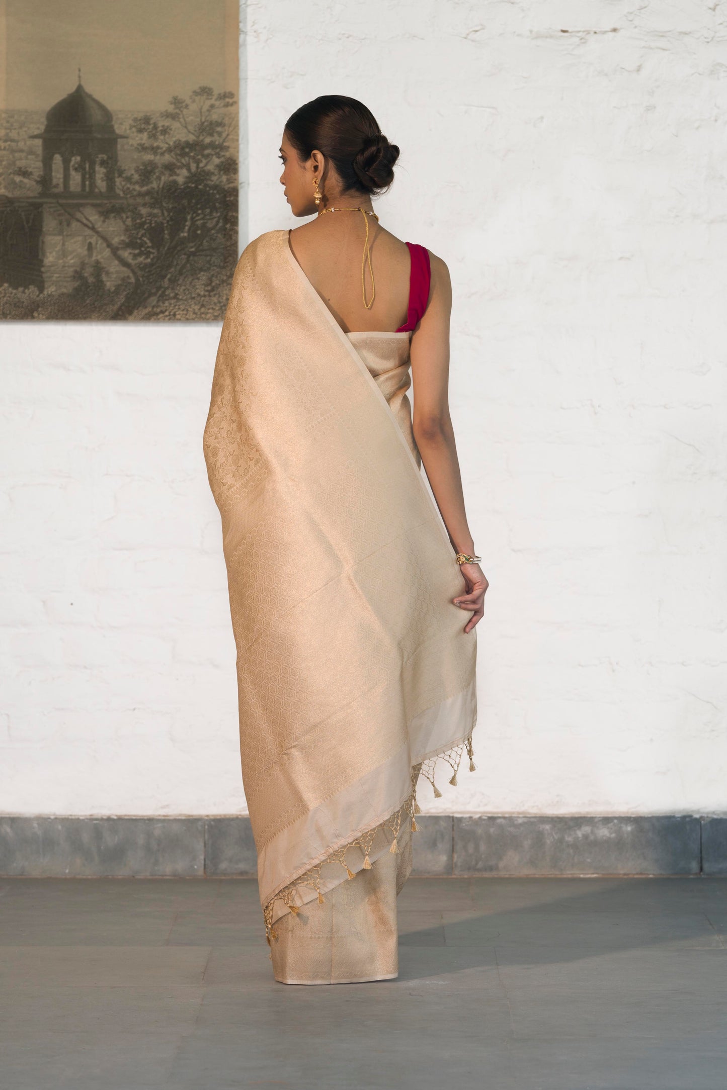 Cream Soft Silk Saree Woven in Almond Zari within the Fabric giving smooth texture from in and out