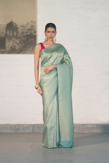 Sea Green Soft Silk Saree Woven in Almond Zari within the Fabric giving smooth texture from in and out