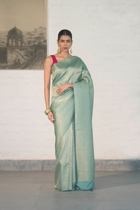 Sea Green Soft Silk Saree Woven in Almond Zari within the Fabric giving smooth texture from in and out