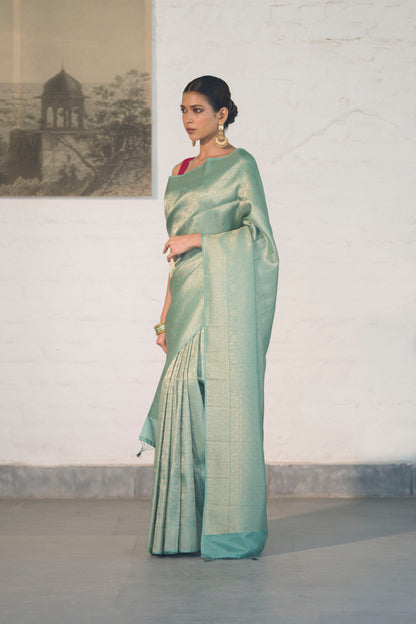 Sea Green Soft Silk Saree Woven in Almond Zari within the Fabric giving smooth texture from in and out