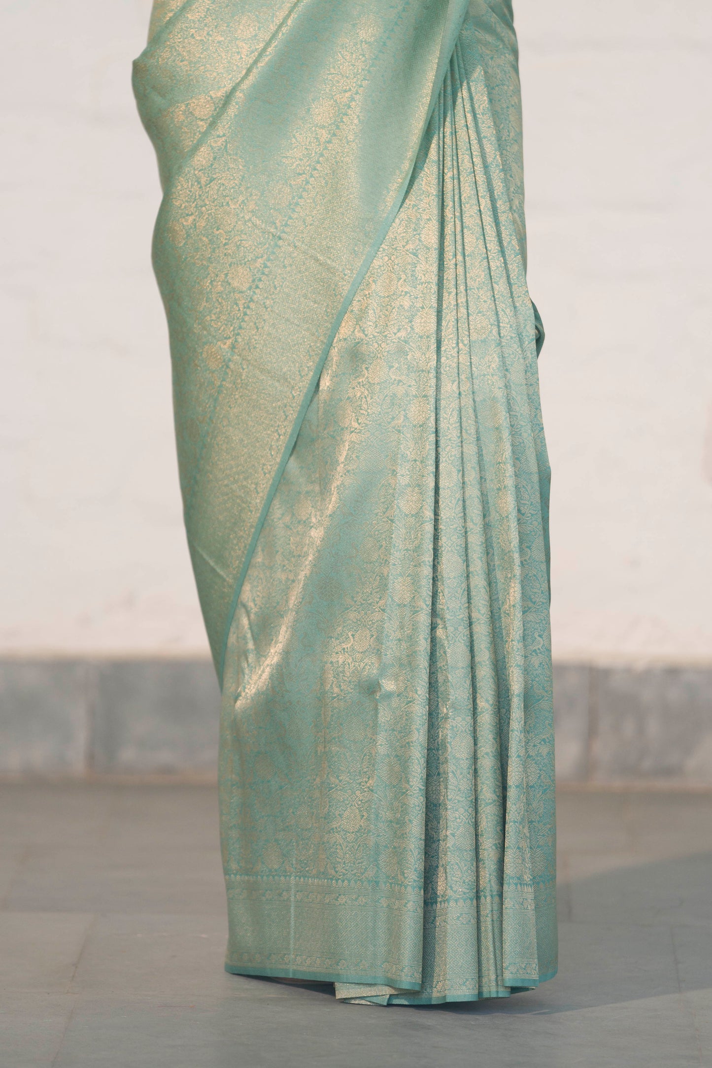 Sea Green Soft Silk Saree Woven in Almond Zari within the Fabric giving smooth texture from in and out