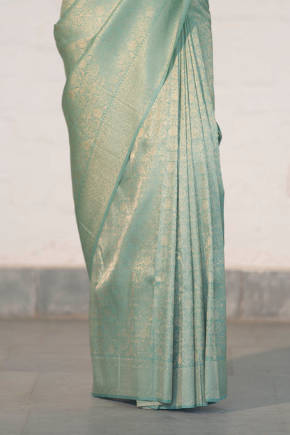Sea Green Soft Silk Saree Woven in Almond Zari within the Fabric giving smooth texture from in and out