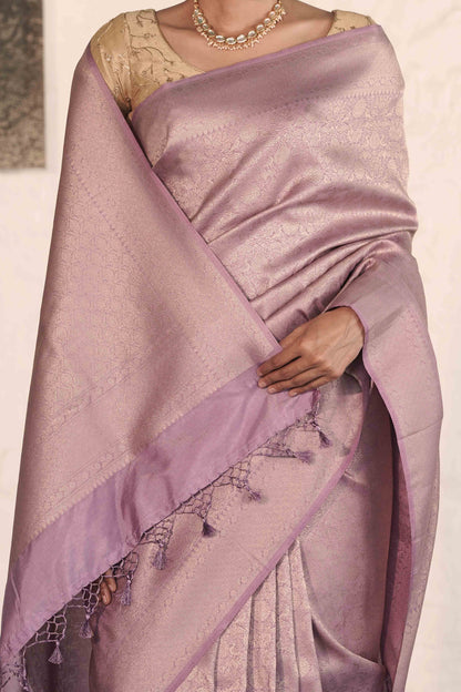 Lilac Soft Silk Saree Woven in Almond Zari within the Fabric giving smooth texture from in and out