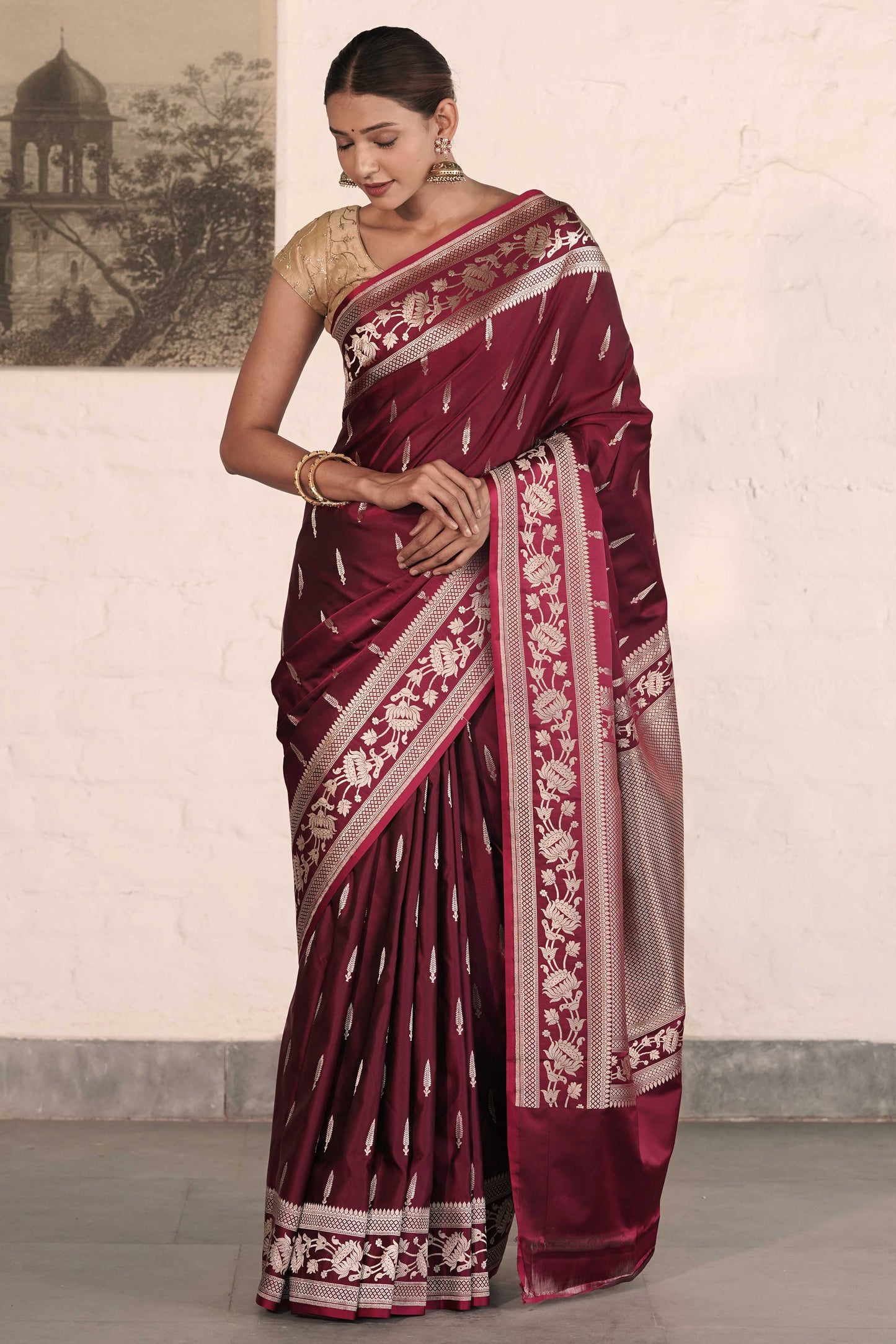 Wine Mashru Silk Saree woven in Leaf inspired butis across body paired with Floral bel border