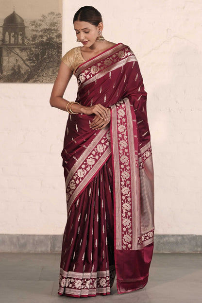 Wine Mashru Silk Saree woven in Leaf inspired butis across body paired with Floral bel border