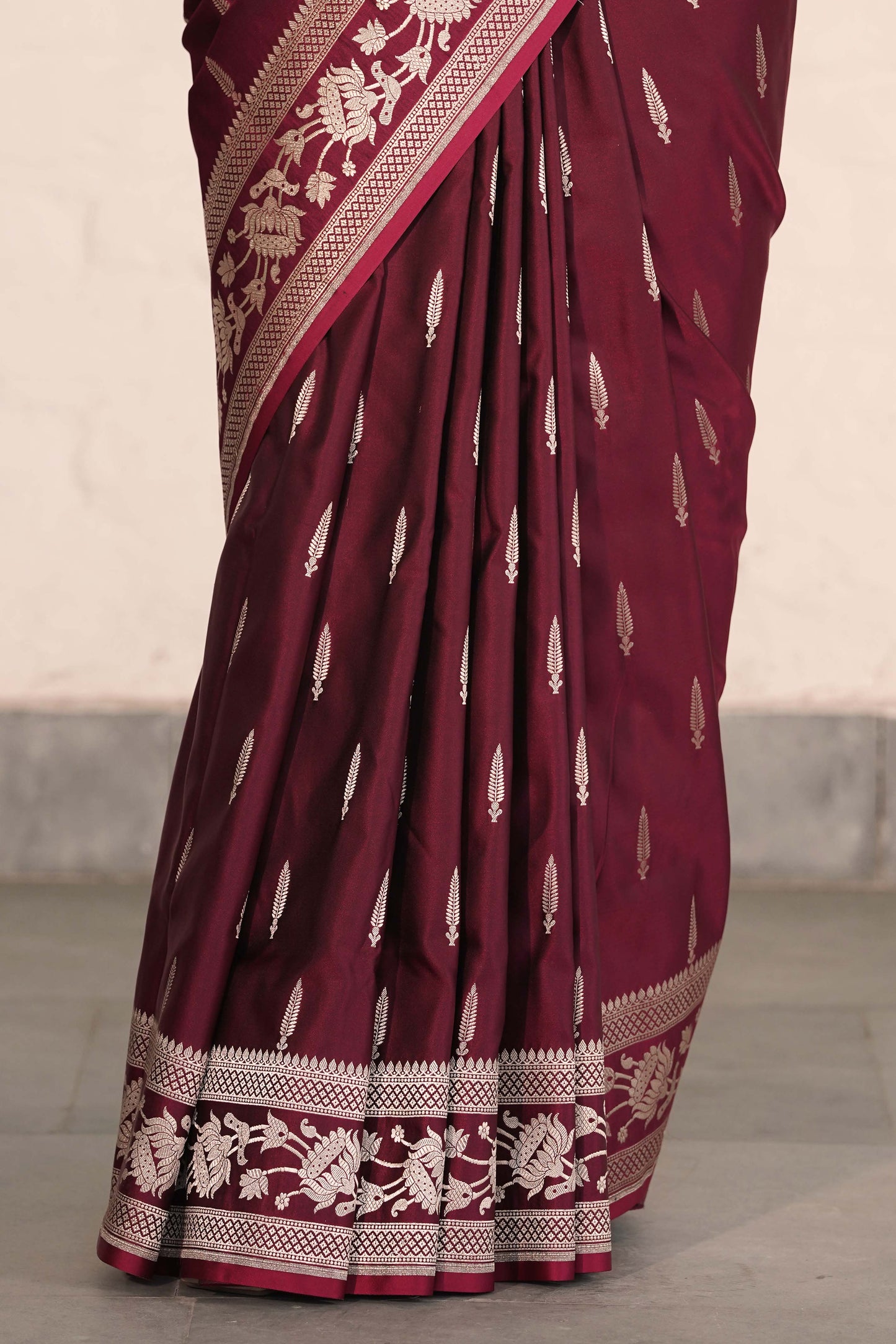 Wine Mashru Silk Saree woven in Leaf inspired butis across body paired with Floral bel border