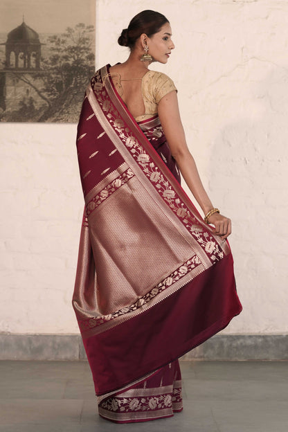 Wine Mashru Silk Saree woven in Leaf inspired butis across body paired with Floral bel border