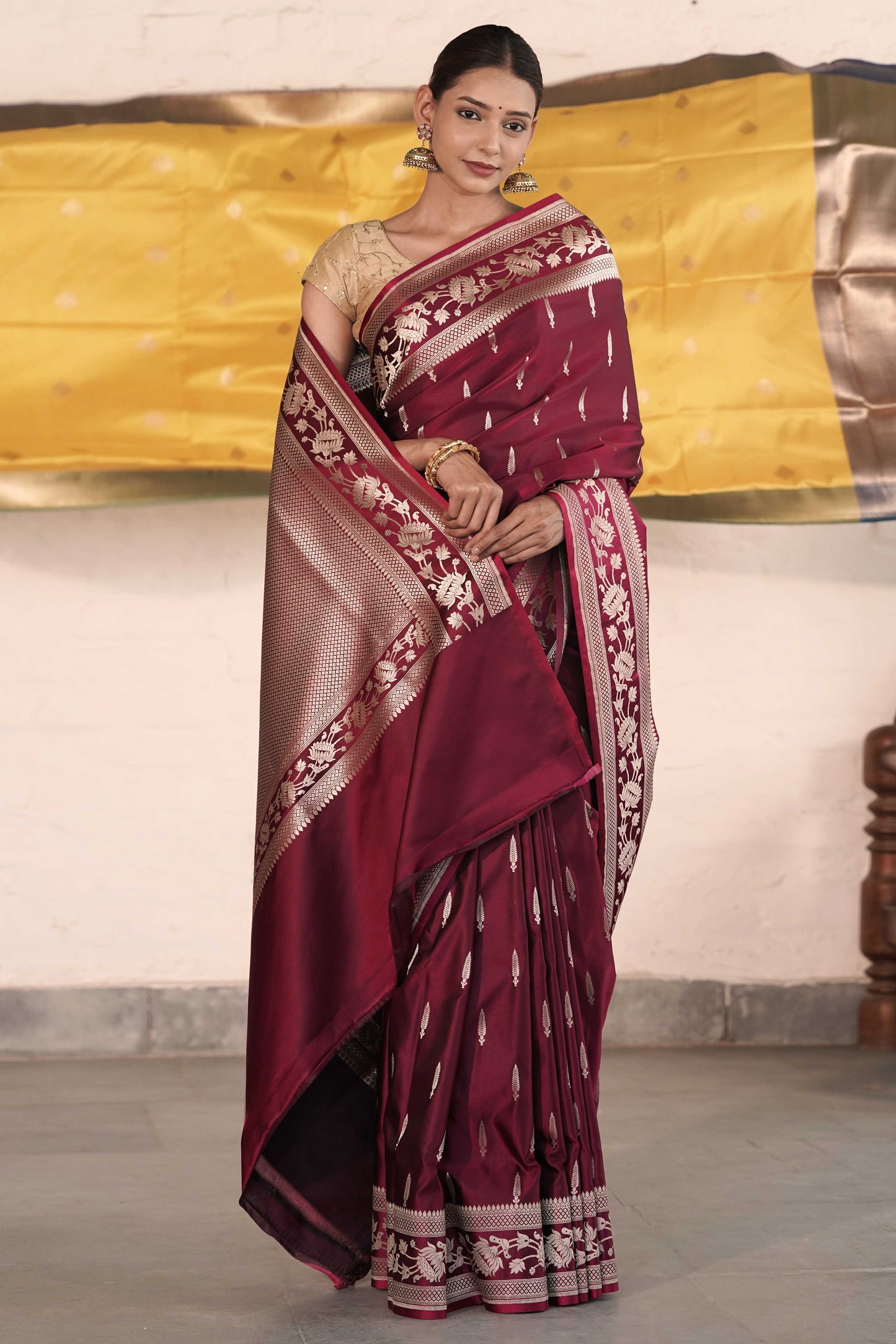 Wine Mashru Silk Saree woven in Leaf inspired butis across body paired with Floral bel border