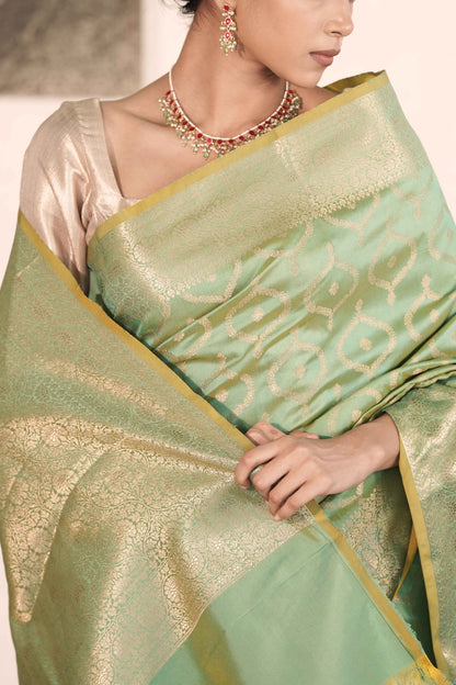 Green Dual Tone Banarasi Silk Saree woven in Necklace Buta all over body and Rich Golden Zari Palla