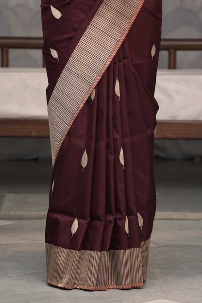 Brown Pure Banarasi Katan Silk Saree with Leaf Swaying motif and vertically  stripe designed Marvelous Border Palla