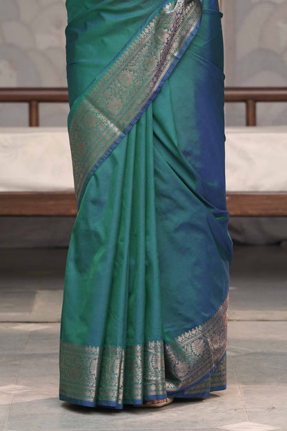 Peacock Dual Tone Plain Blend Silk Saree with traditional border palla and woven blouse