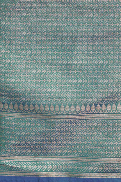 Peacock Dual Tone Plain Blend Silk Saree with traditional border palla and woven blouse