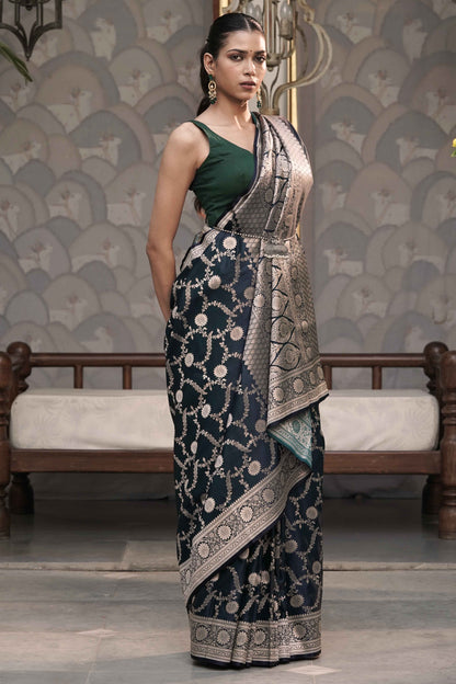 Teal Blue Mashru Silk Saree Woven in Traditonal jangla with Rich Golden Zari Palla