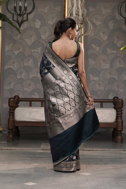 Teal Blue Mashru Silk Saree Woven in Traditonal jangla with Rich Golden Zari Palla
