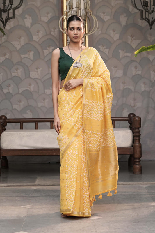 Yellow Pure chanderi Silk Saree With Block print and accessorised with tassels on pallu