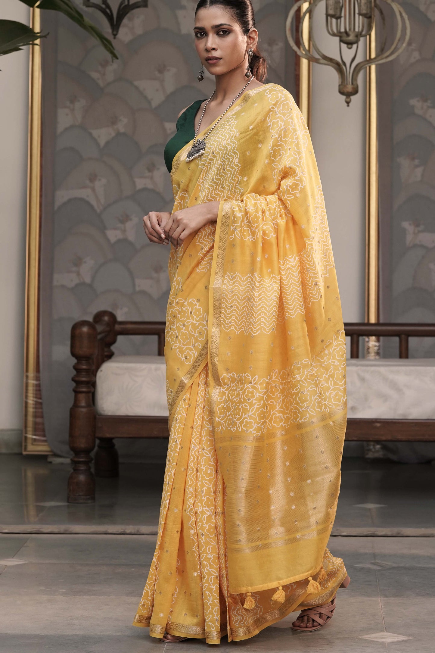 Yellow Pure chanderi Silk Saree With Block print and accessorised with tassels on pallu