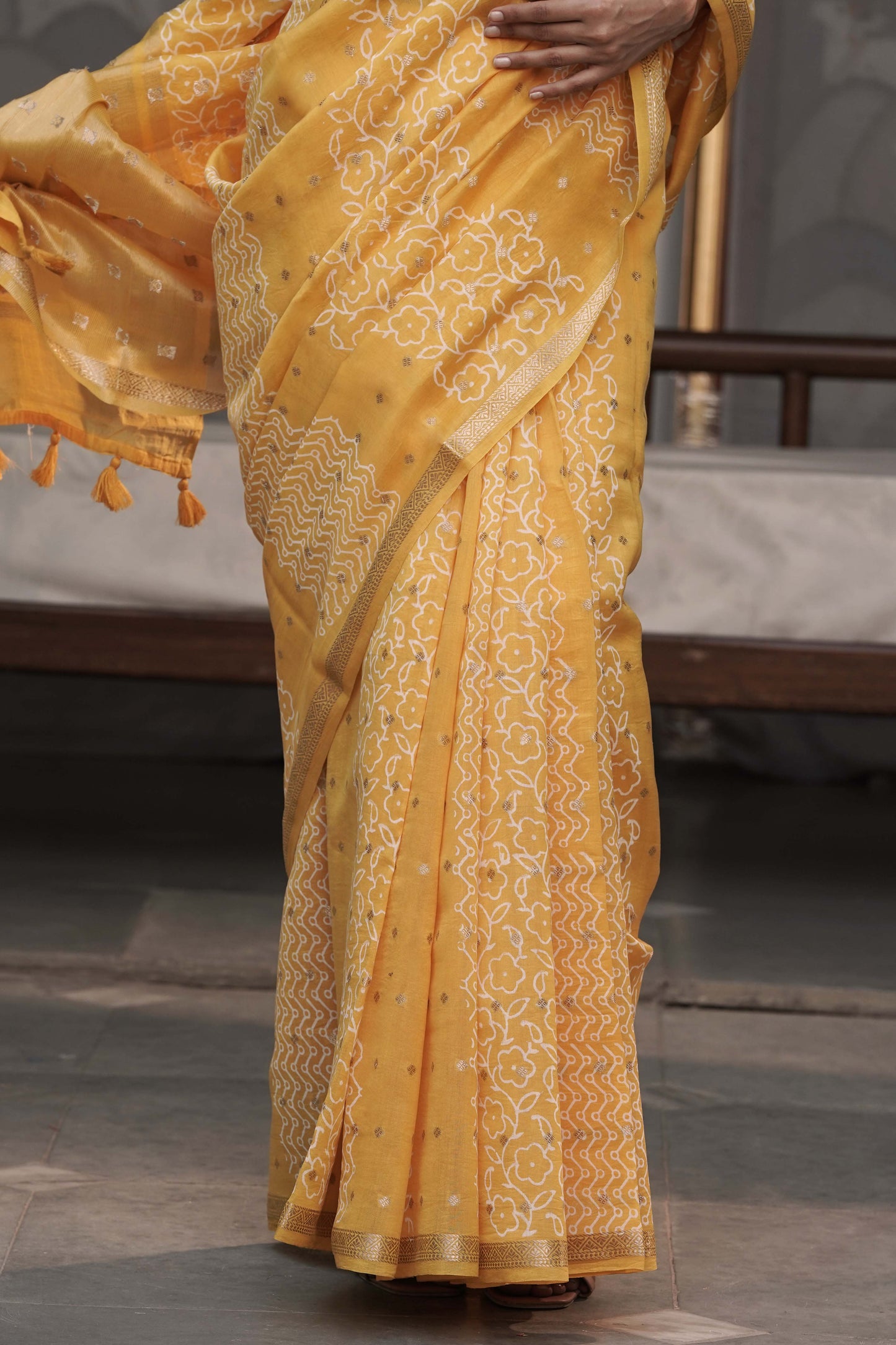 Yellow Pure chanderi Silk Saree With Block print and accessorised with tassels on pallu