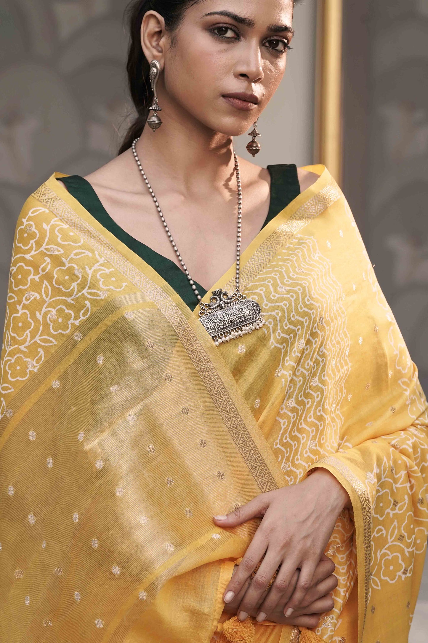 Yellow Pure chanderi Silk Saree With Block print and accessorised with tassels on pallu
