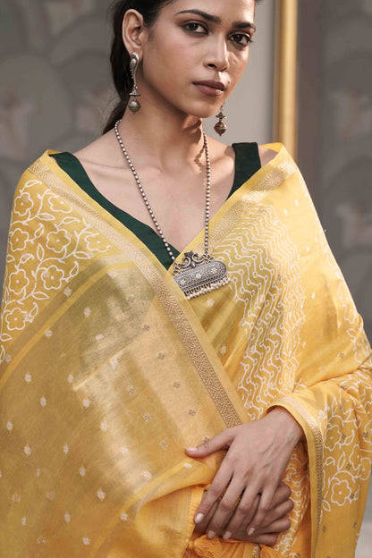 Yellow Pure chanderi Silk Saree With Block print and accessorised with tassels on pallu