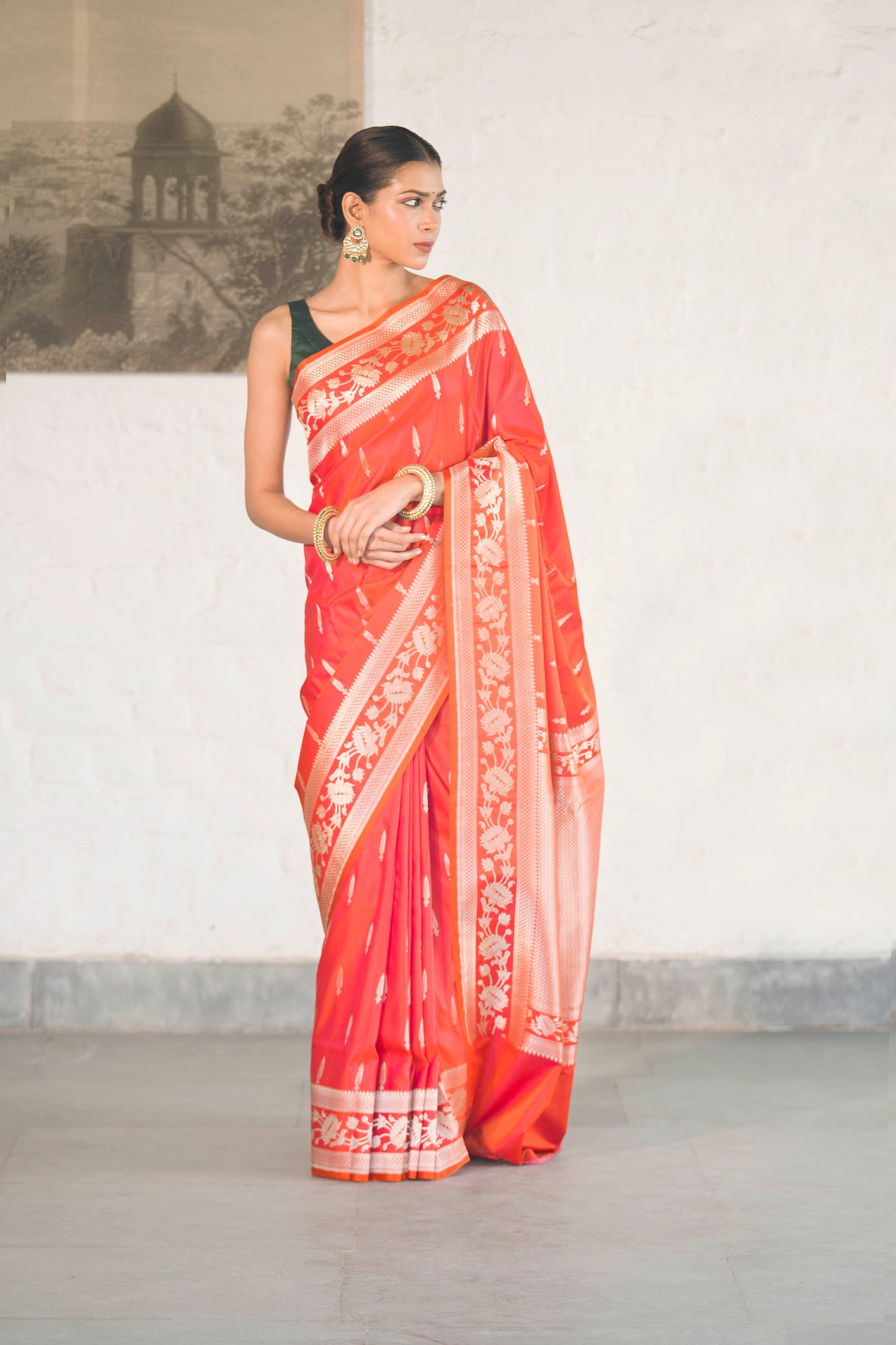 Orange Mashru Silk Saree woven in Leaf inspired butis across body paired with Floral bel border