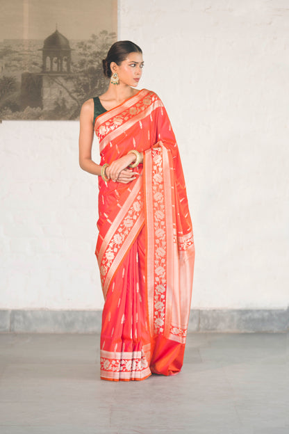 Orange Mashru Silk Saree woven in Leaf inspired butis across body paired with Floral bel border