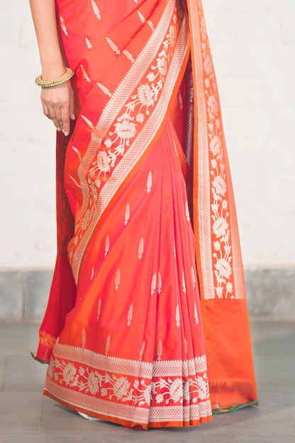 Orange Mashru Silk Saree woven in Leaf inspired butis across body paired with Floral bel border
