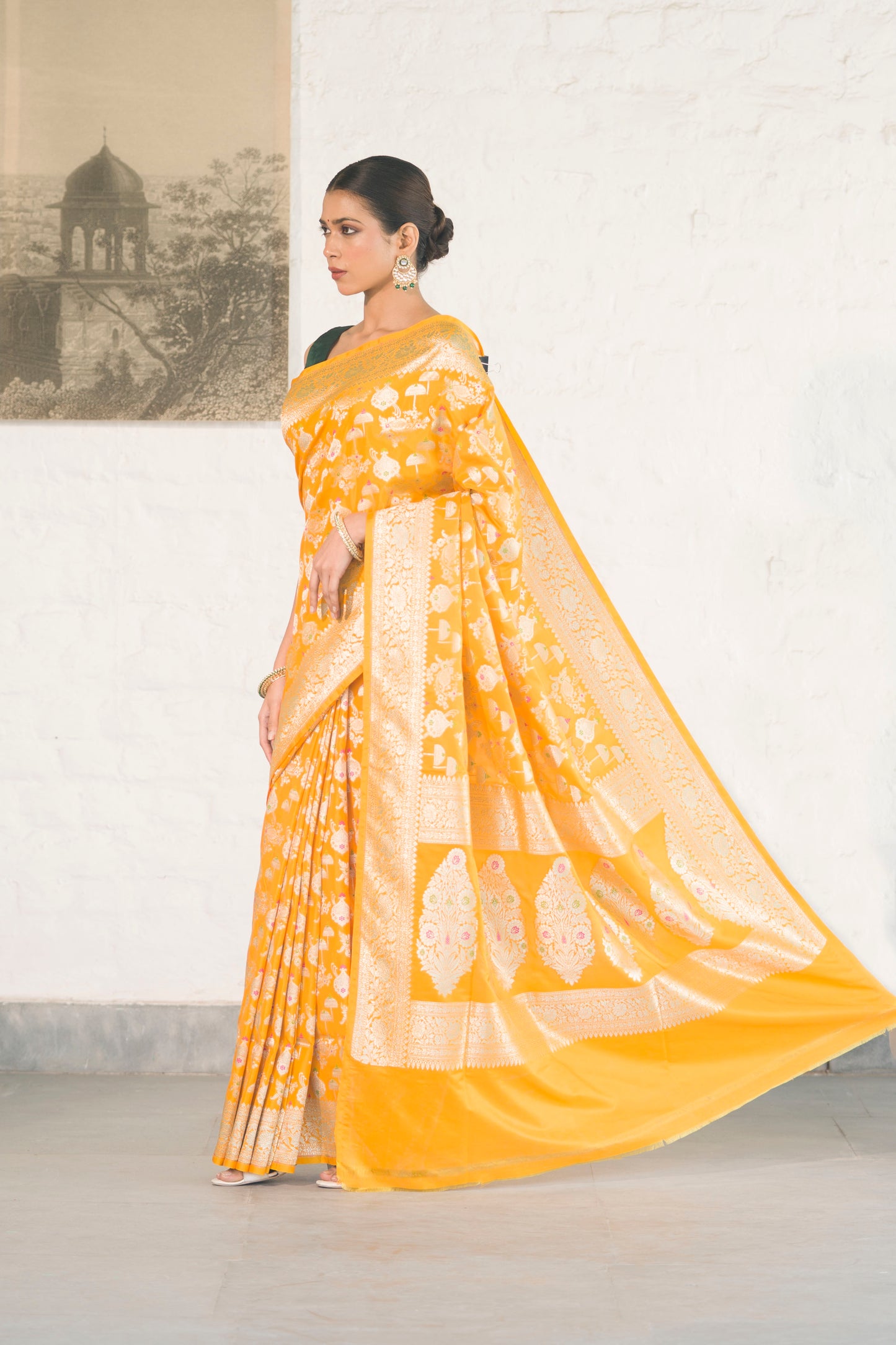 Yellow Katan Silk Blend featuring baraat ghar and jaal woven with meenakari and zari work