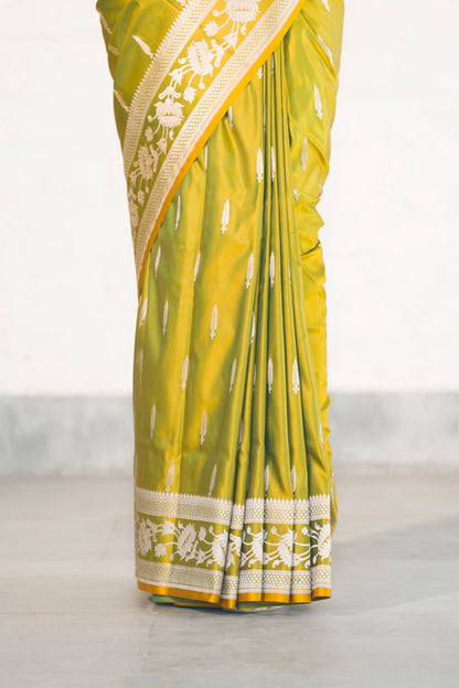 Green Dual Tone Mashru Silk Saree woven in Leaf inspired butis across body paired with Floral bel border