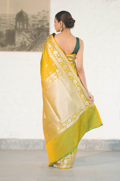 Green Dual Tone Mashru Silk Saree woven in Leaf inspired butis across body paired with Floral bel border