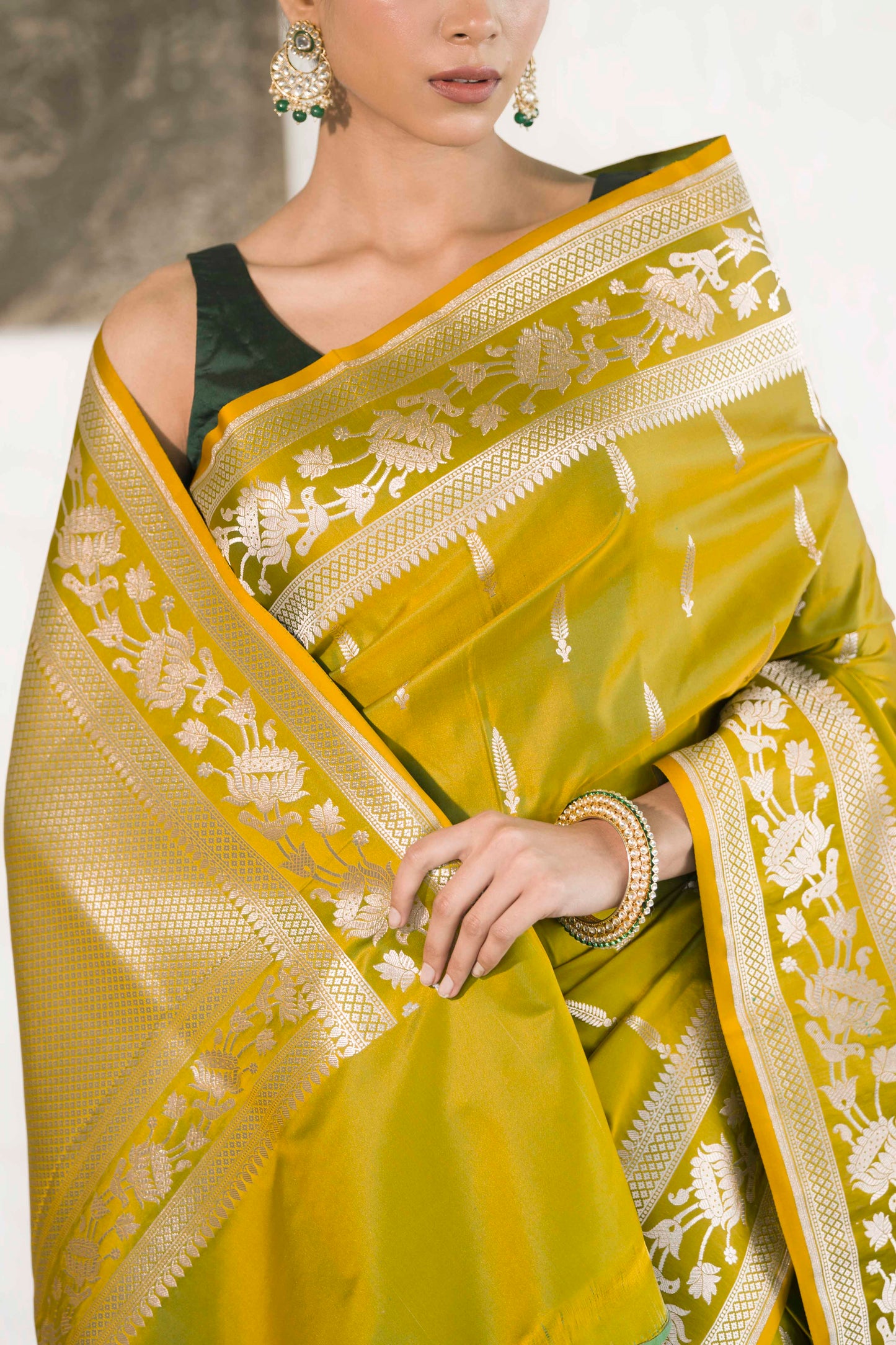 Green Dual Tone Mashru Silk Saree woven in Leaf inspired butis across body paired with Floral bel border