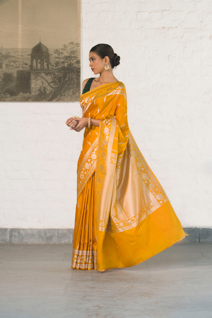 Yellow Mashru Silk Saree woven in Leaf inspired butis across body paired with Floral bel border